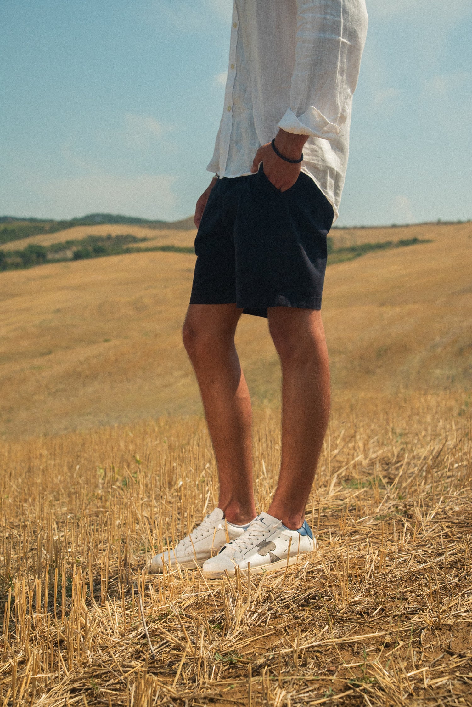 Distressed Leather Sneaker: Geneva - NAVY HEEL